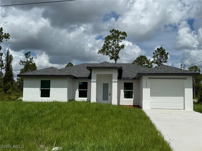 322 McArthur Blvd in Lehigh Acres, FL - Building Photo - Building Photo