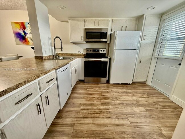 property at 445 NE 195th St