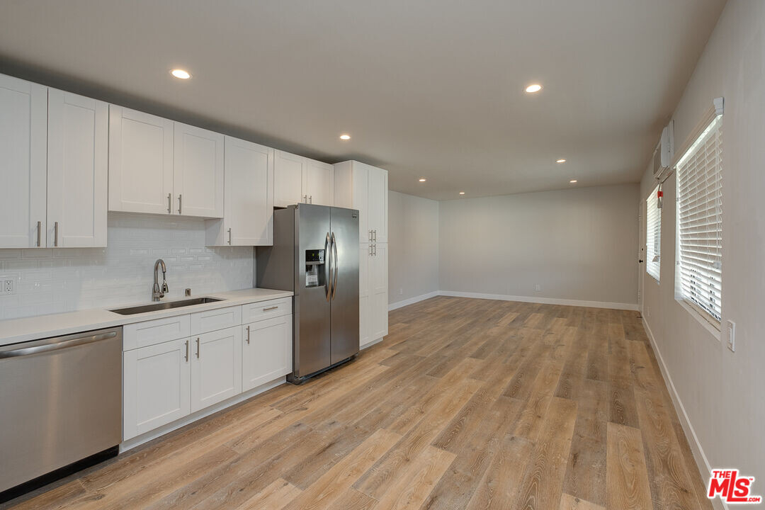 4703 W St Charles Pl in Los Angeles, CA - Building Photo