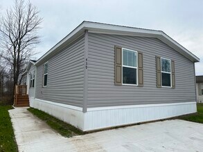 439 Laurel Oak Ln in Whittaker, MI - Building Photo - Building Photo
