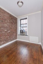 East 1st Street, Unit 4F in New York, NY - Building Photo - Building Photo