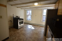 218 Cambridge St, Unit 1 in Boston, MA - Foto de edificio - Building Photo