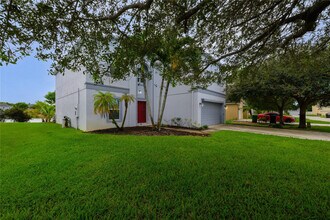 6147 NW Butterfly Orchid Pl in Port St. Lucie, FL - Building Photo - Building Photo