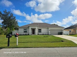 5211 NW W Piper Cir in Port St. Lucie, FL - Building Photo - Building Photo