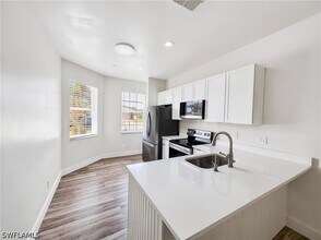 9750 Sassafras Ct in Estero, FL - Building Photo - Building Photo