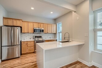 Dazzling North Capitol Hill home with fenced yard in Denver, CO - Building Photo - Building Photo