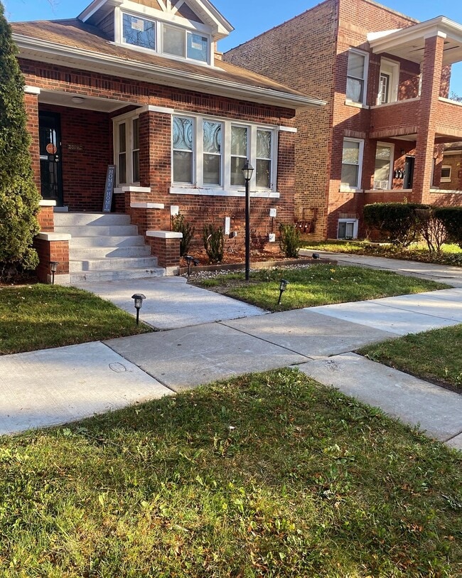 property at 8027 S Kimbark Ave