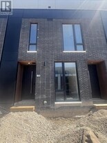 64 Everett Cmn in St Catharines, ON - Building Photo