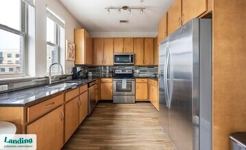 1550 N Raleigh St, Unit W-426 in Denver, CO - Building Photo - Building Photo