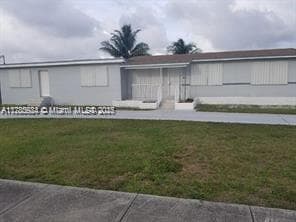 property at 16115 NW 42nd Ave