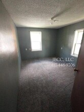 629 N Olive St in Nevada, MO - Building Photo - Building Photo