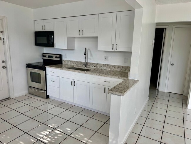 718-720-720 SW 7th St