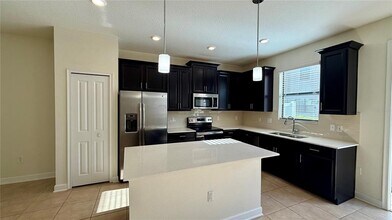 8548 Zoeller Hills Dr in Four Corners, FL - Building Photo - Building Photo