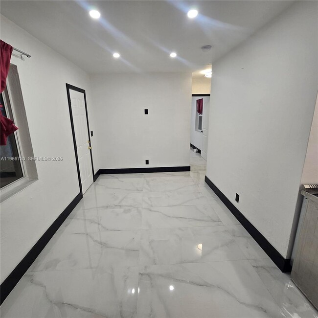 property at 77 NW 51st St