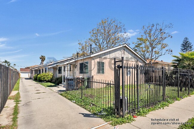 property at 1143 1/2 W 91st St