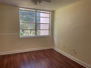 9495 Evergreen Pl, Unit 207 in Davie, FL - Building Photo - Building Photo