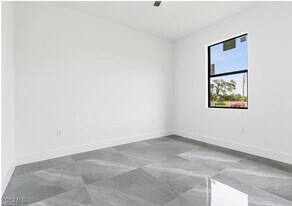 128 Nave Ave S in Lehigh Acres, FL - Building Photo