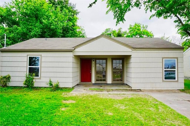 property at 414 E 1st St
