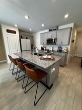 1631 Mirabella Cir in Davenport, FL - Foto de edificio - Building Photo