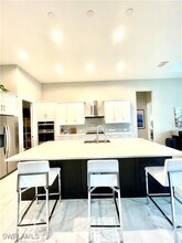 14330 Laguna Spgs Ln in Naples, FL - Building Photo - Building Photo