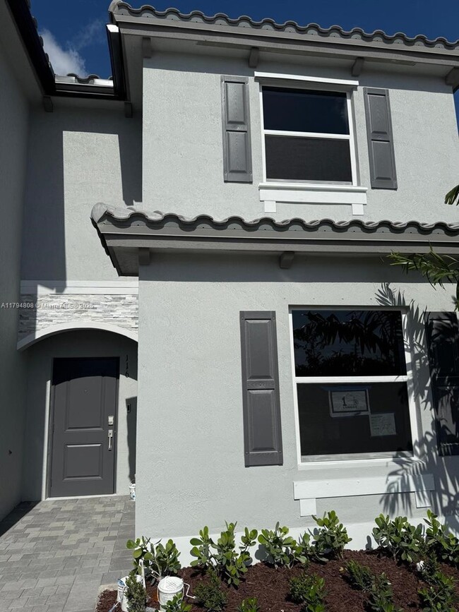 property at 116 NW 11th Ct