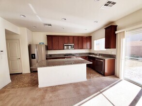 5577 Chiflo Song Dr in Las Vegas, NV - Building Photo - Building Photo