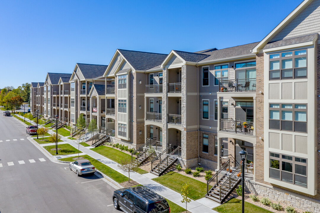 West House at Foxtown + Foxtown Townhomes in Mequon, WI - Building Photo