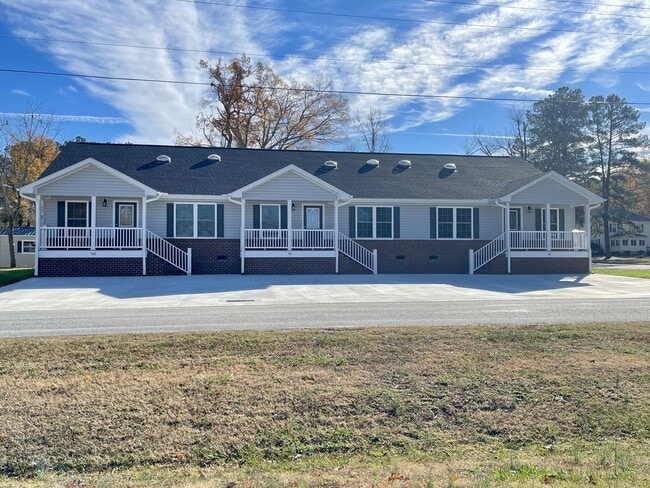property at 102N-106 N Maple St