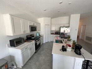 1406 Deepwater Cir in Eagle Lake, FL - Building Photo - Building Photo