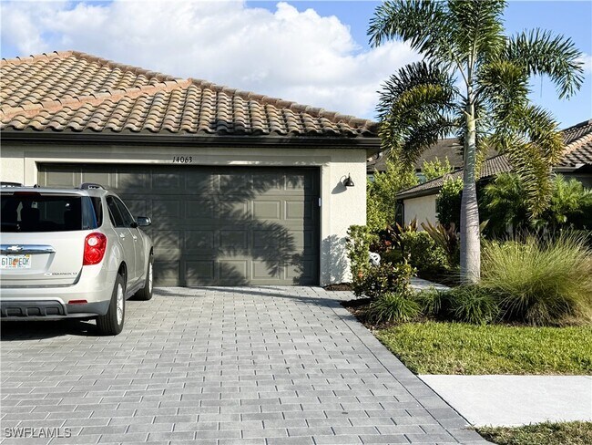 14063 Winding Cedar Wy in Miromar Lakes, FL - Building Photo - Building Photo