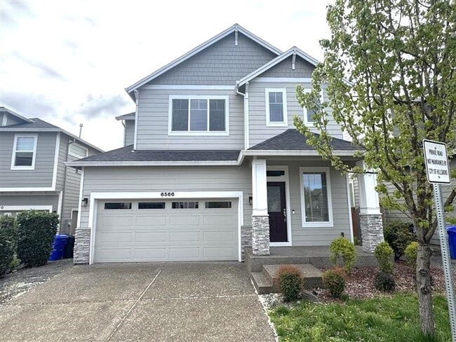 property at 6566 NE Rainsong Ln