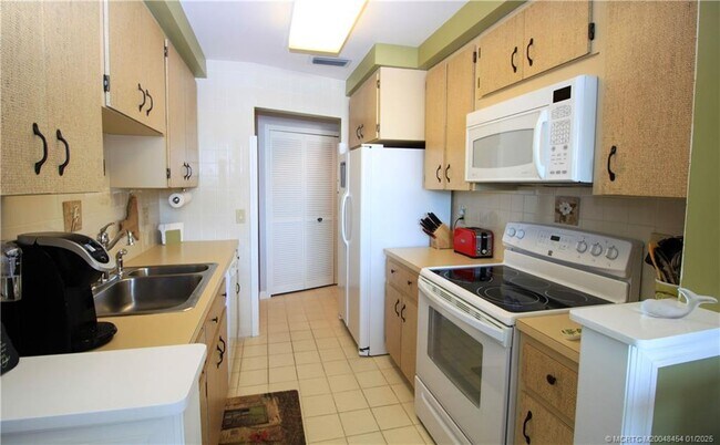 property at 150 SE Four Winds Dr