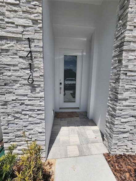 1416 Wanderlust Ln in Four Corners, FL - Foto de edificio - Building Photo