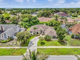 13656 Carlton St in Wellington, FL - Building Photo