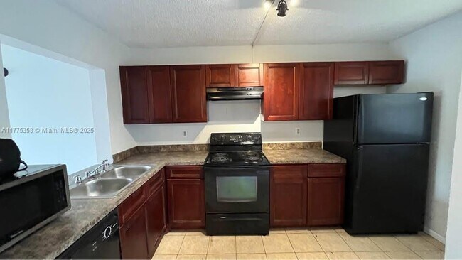 property at 9044 NW 28th Dr