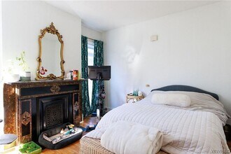 129 College St, Unit Unit 3 - Upper Back in Buffalo, NY - Building Photo - Building Photo