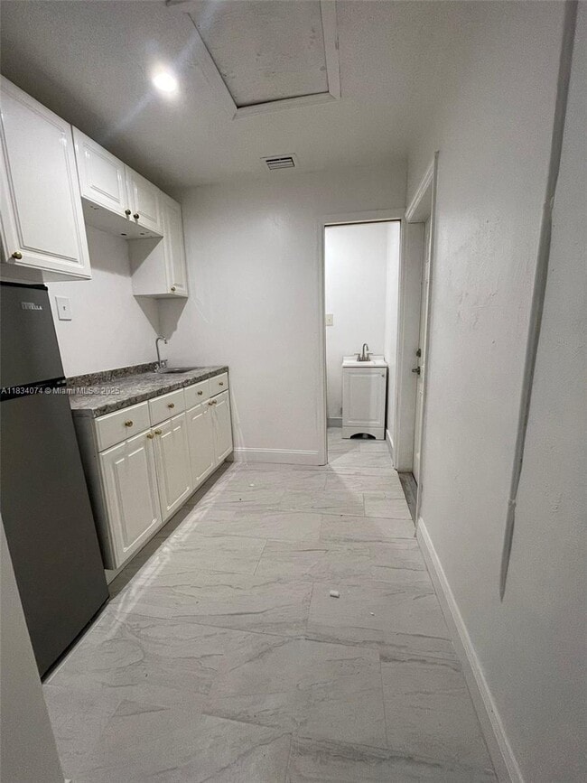 property at 4714 NW 50th St