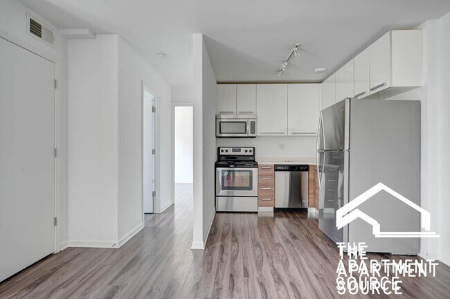 925 W Carmen Ave, Unit 7B in Chicago, IL - Foto de edificio - Building Photo