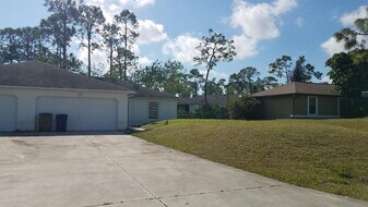 4713-4715 1st St SW in Lehigh Acres, FL - Building Photo