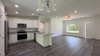 122 Malauka Loop in Ocklawaha, FL - Building Photo - Building Photo