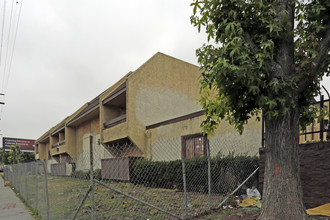 Rolland Curtis Gardens Apartments in Los Angeles, CA - Building Photo - Building Photo