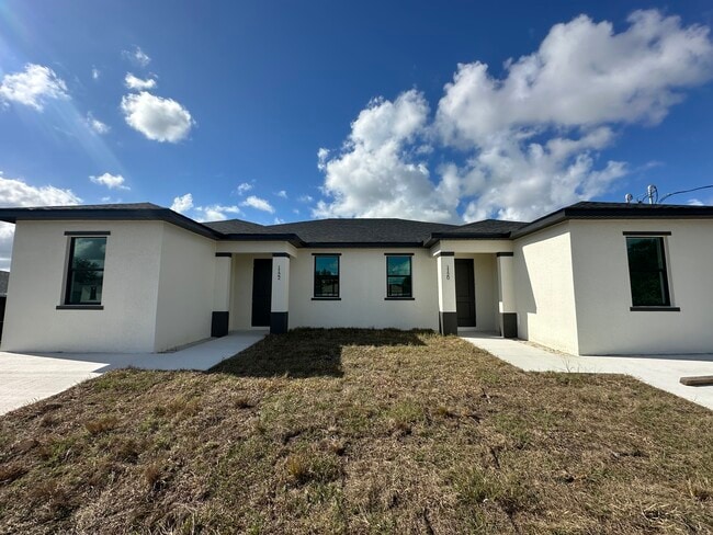 1122 Homer Ave S in Lehigh Acres, FL - Building Photo - Building Photo