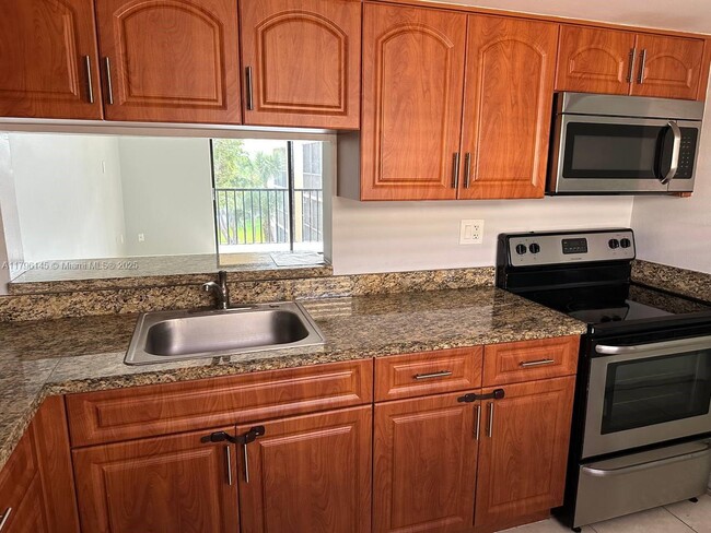 8420 SW 133rd Avenue Rd, Unit 415 in Miami, FL - Building Photo - Building Photo