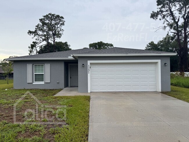 1131 Tiger St SE in Palm Bay, FL - Building Photo - Building Photo