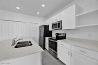 14236 Oviedo Pl in Ft. Myers, FL - Foto de edificio - Building Photo