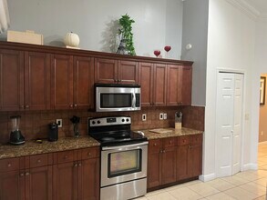 3718 SW Masilunas St in Port St. Lucie, FL - Building Photo - Building Photo