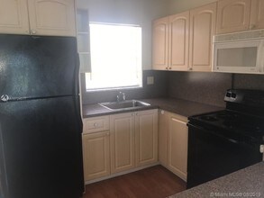 2998 Sunrise Lakes Dr E-Unit -410 in Sunrise, FL - Building Photo - Building Photo