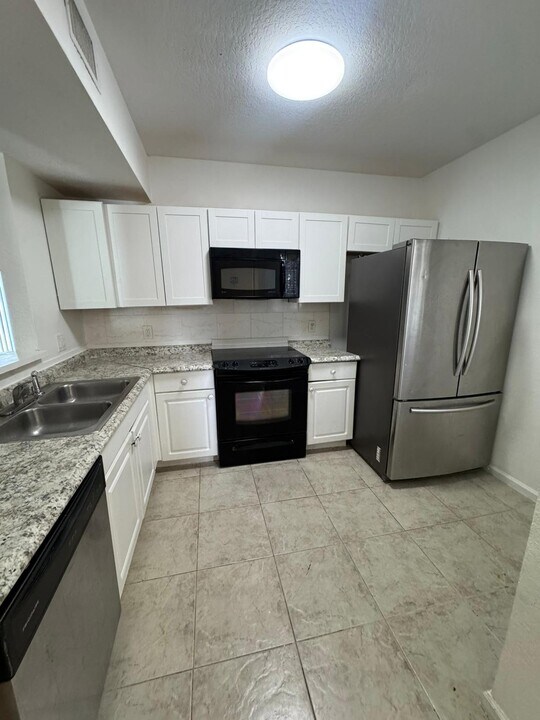 1157 Golden Lakes Blvd in West Palm Beach, FL - Building Photo