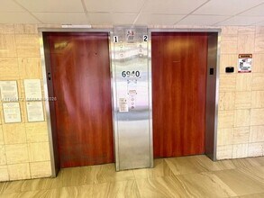 6940 Miami Gardens Dr, Unit 1-329 in Hialeah, FL - Building Photo - Building Photo