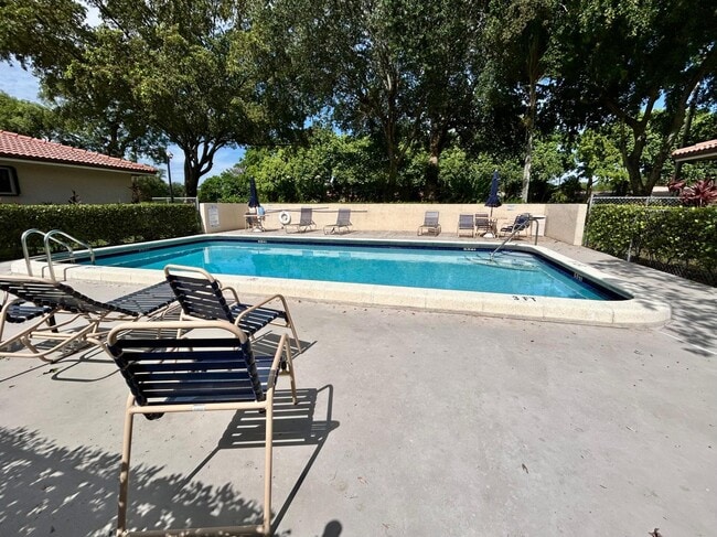 property at 9649 NW 4th St